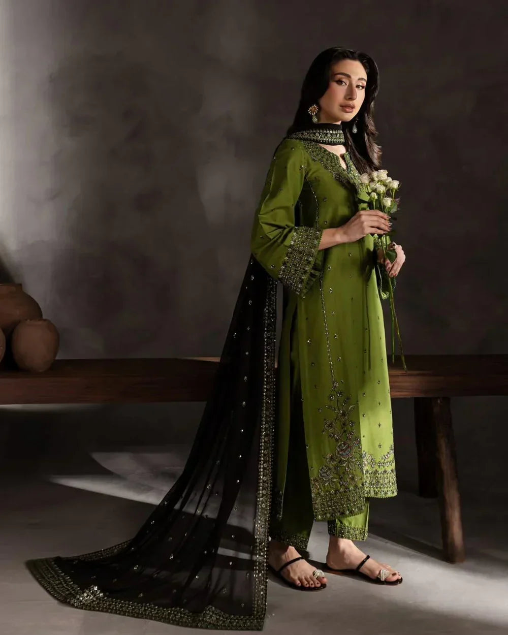 Detailed sleeve and hem embroidery of olive lawn kurta