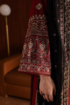 Close up of chest embroidery on crimson luxury lawn shirt