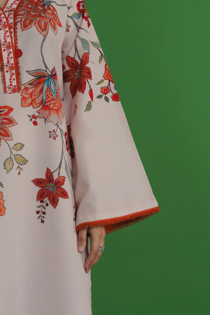 Black and white geometric dupatta with coral border draped over shoulder