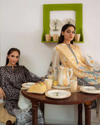 Black poly lawn trouser paired with digital printed kurta