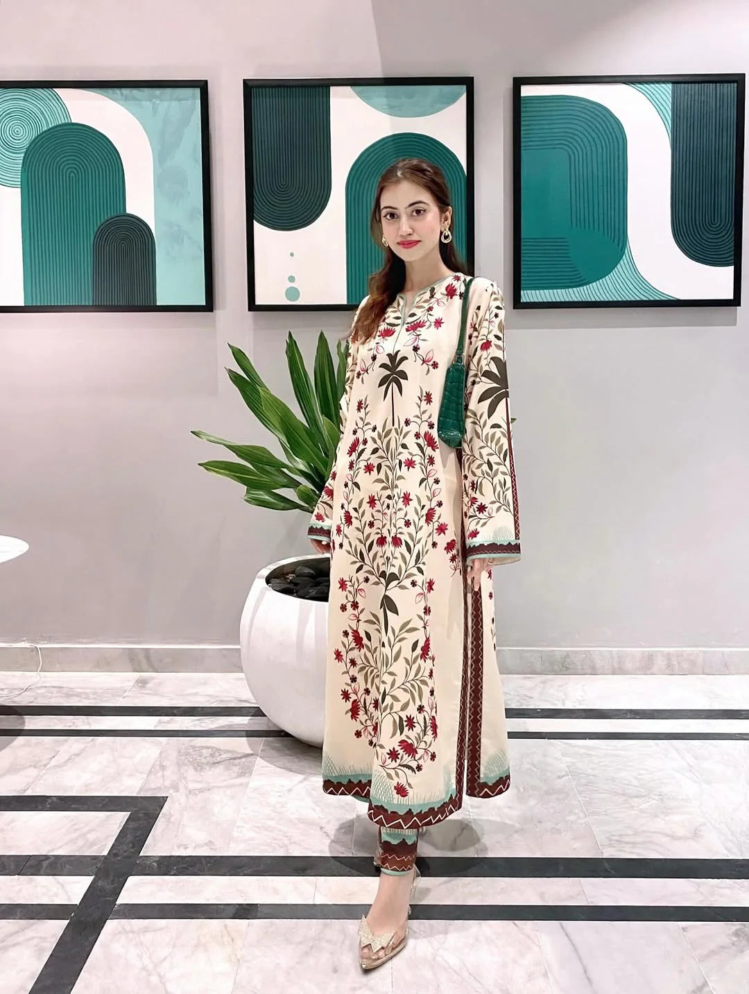 Close-up detail of vibrant digital floral print on shirt ZAMARANG