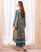Close-up of Mughal floral pattern on teal blue printed shirt