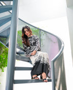 Close-up of floral digital print on black shirt – poly lawn fabric