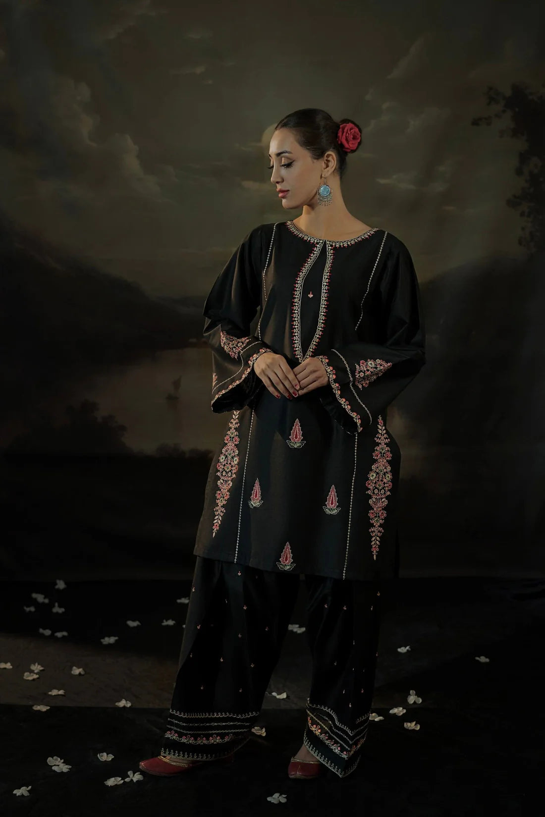 Close-up of floral embroidery on black linen shirt – ZAMARANG