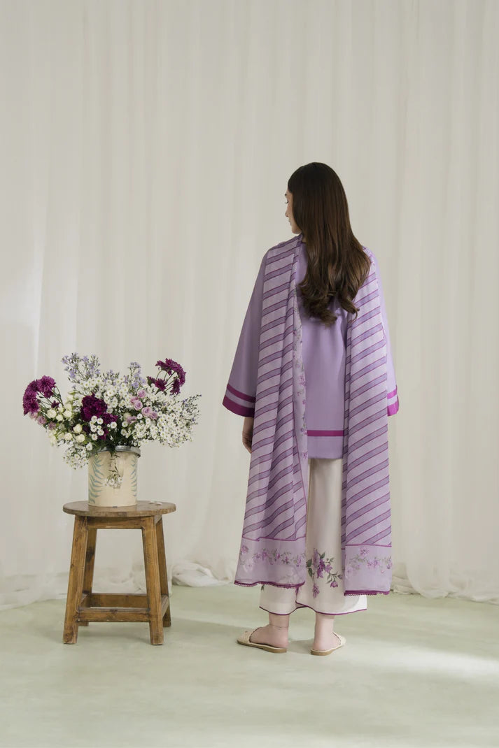 Close-up of lavender kurta tassel neckline