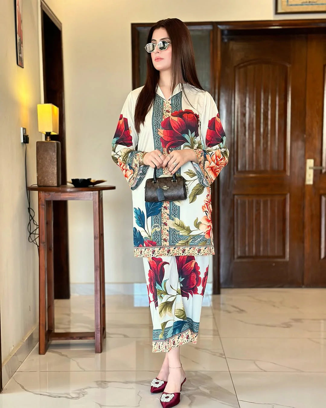 Close-up of vibrant floral digital print on Polly Lawn fabric