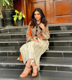 Close-up of vibrant orange and beige digital print design