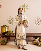 Close up of black embroidery on off white lawn shirt ZAMARANG