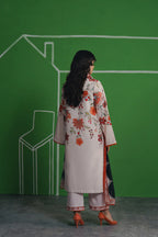 Close up of coral floral neckline detail on ivory kurta