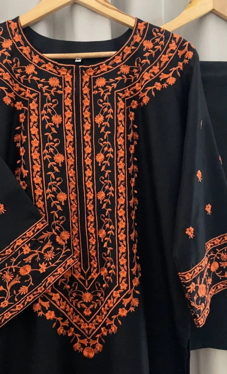 Close up of floral embroidery on Midnight Bloom kurta neckline and sleeves