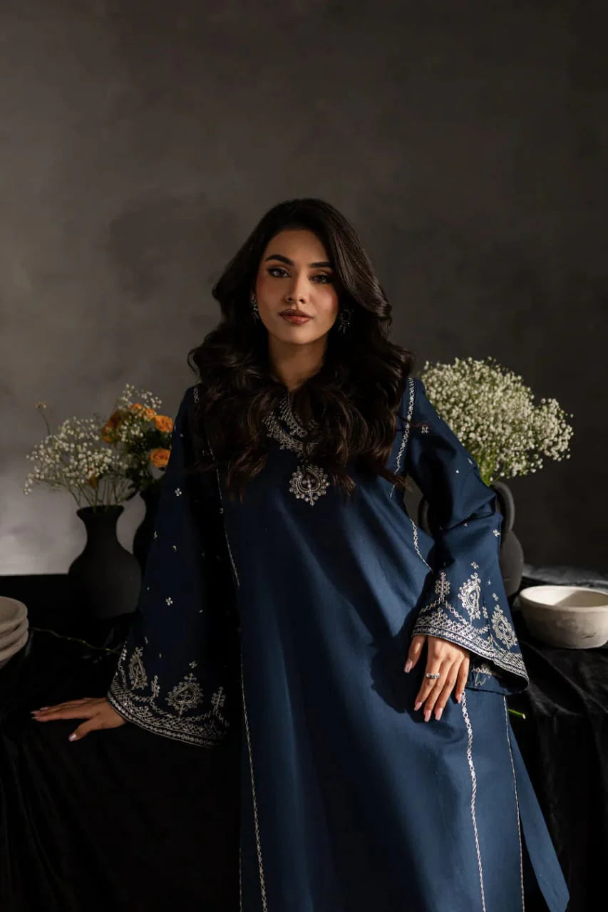 Close up of hand embroidery on Serene Blue kurta neckline and sleeves
