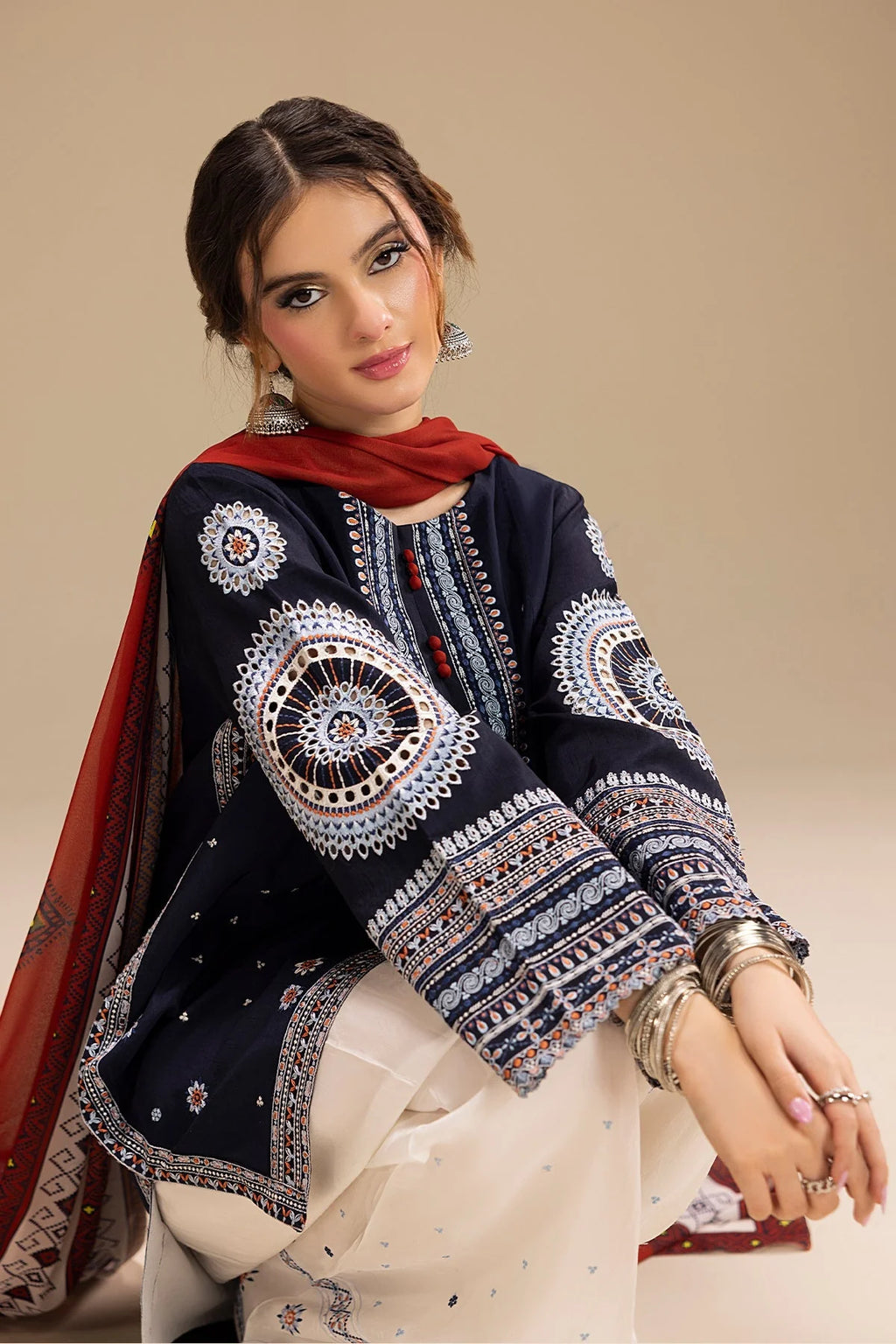 Close up of mandala embroidery on Twilight Mandala kurta sleeve and neckline
