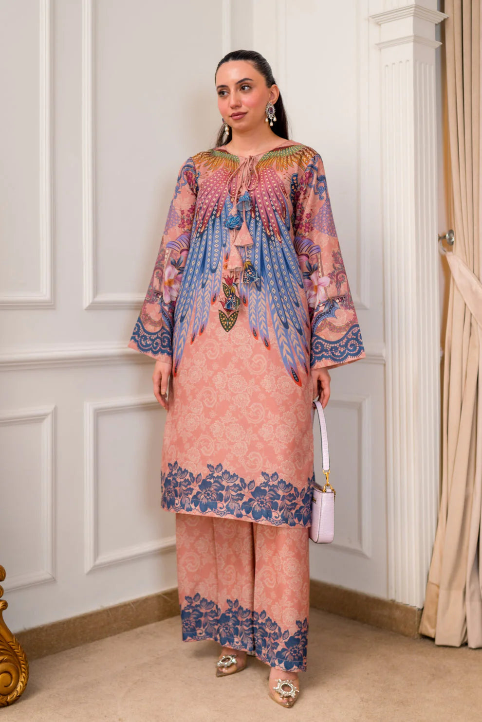 Detail of floral border print at kurta hem and trouser cuff Coral Plume