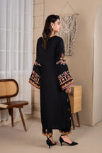 Detailed sleeve embroidery and motif close up of Onyx Bloom set