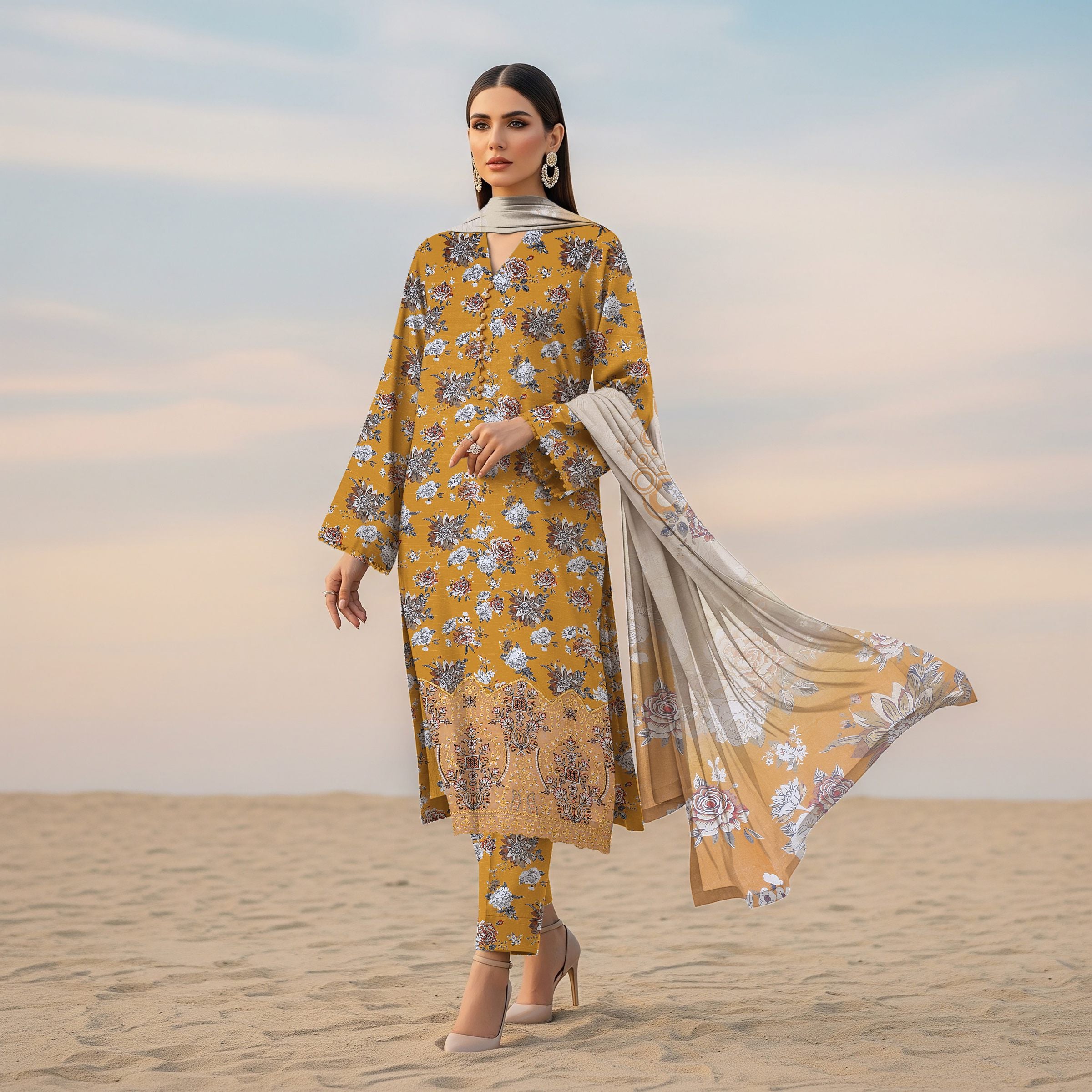 Detailed artisan embroidery on mustard yellow winter suit shirt