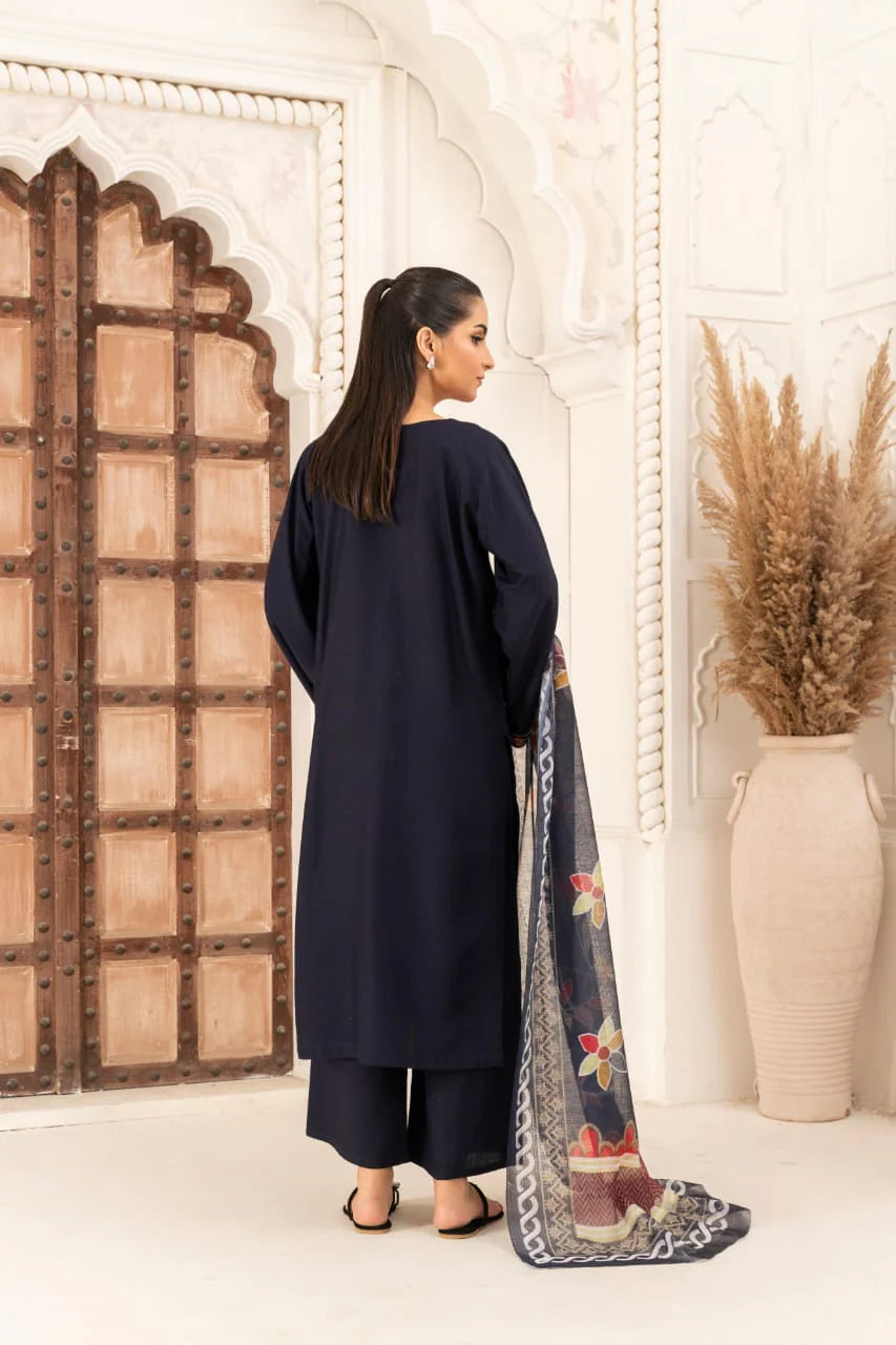 Model showcasing midnight navy floral embroidered 3 piece suit