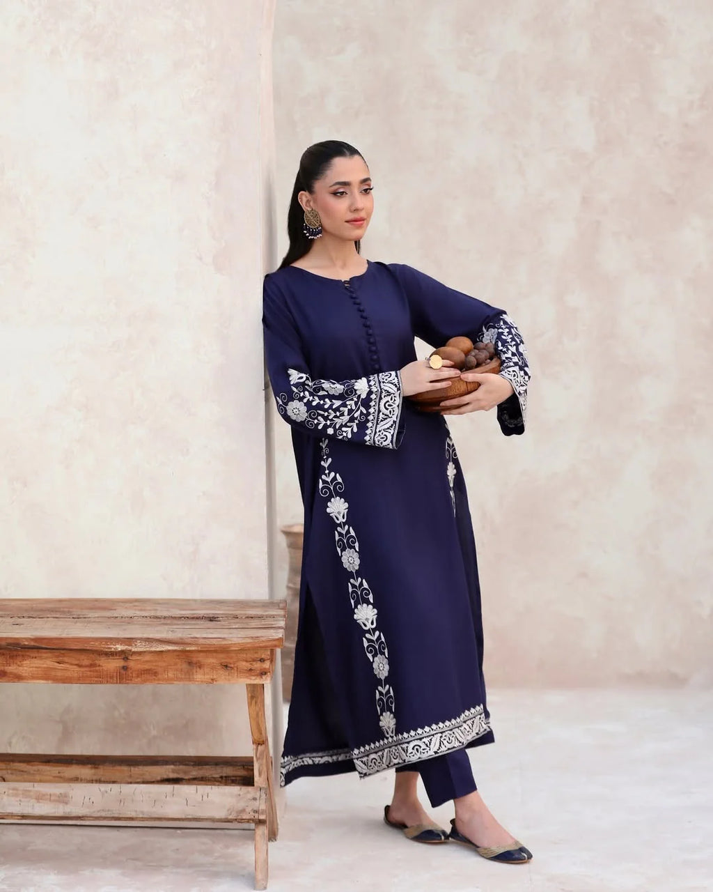 Model wearing ZAMARANG’s embroidered 2-piece linen outfit outdoors