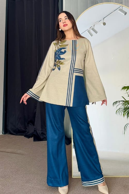 Model wearing beige and teal Korean silk 2 piece digital printed suit