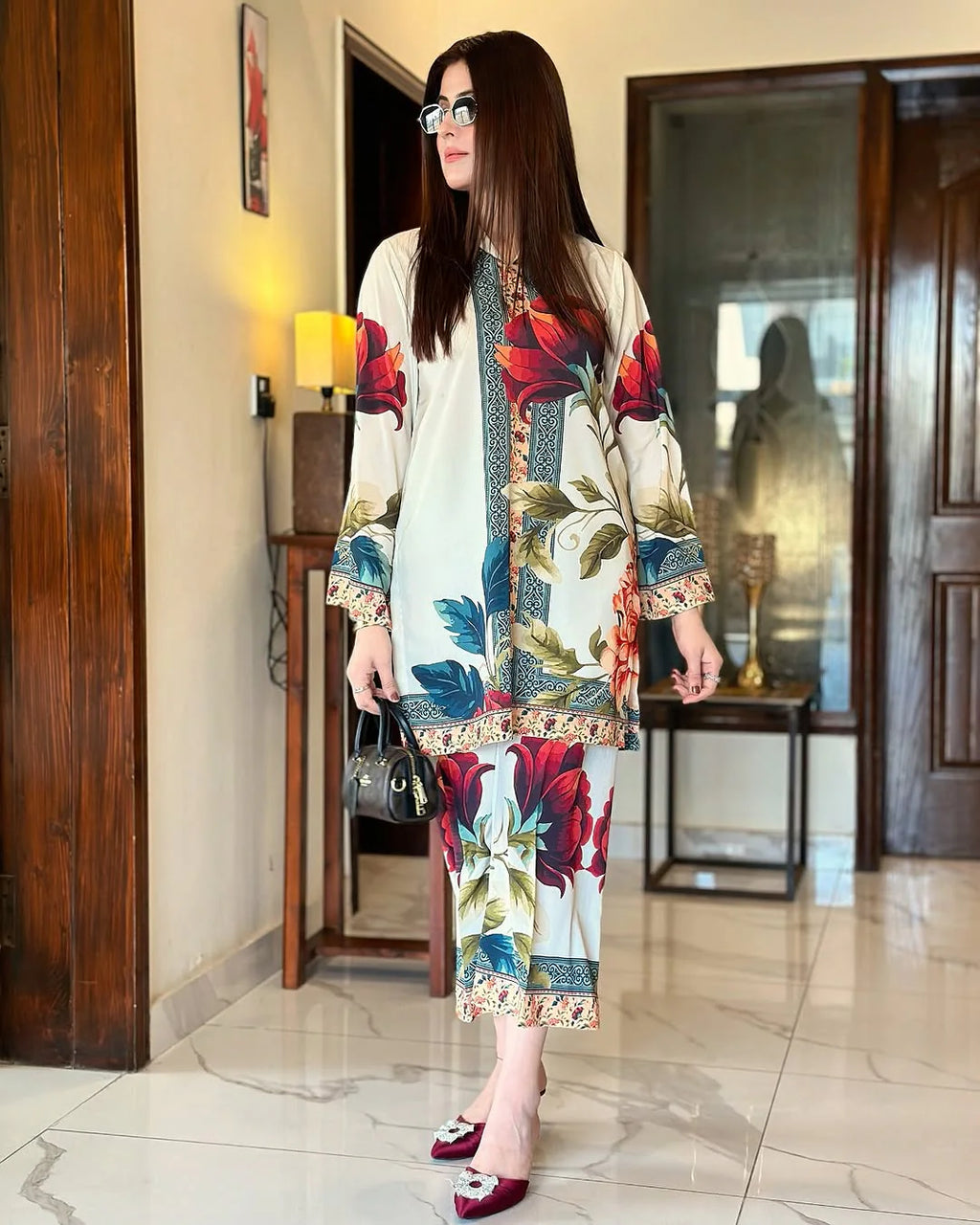 Model wearing cream base printed ready-to-wear outfit