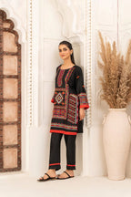 Model wearing elegant embroidered linen stitched 2-piece suit