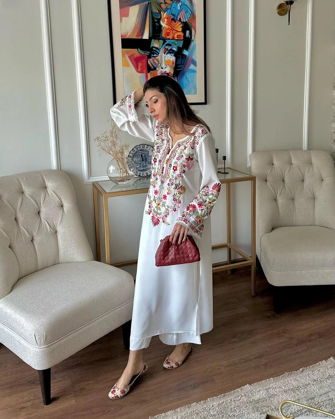 Model wearing ivory white embroidered lawn suit – front pose