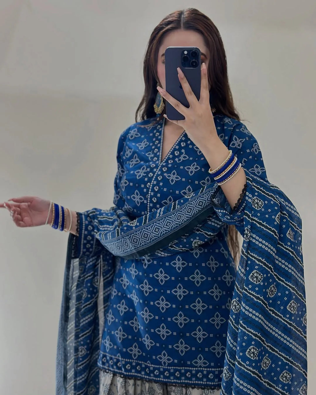 Model wearing stitched three piece deep pattern polly lawn suit by ZAMARANG