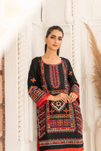 Plain linen trouser paired with embroidered shirt for casual wear