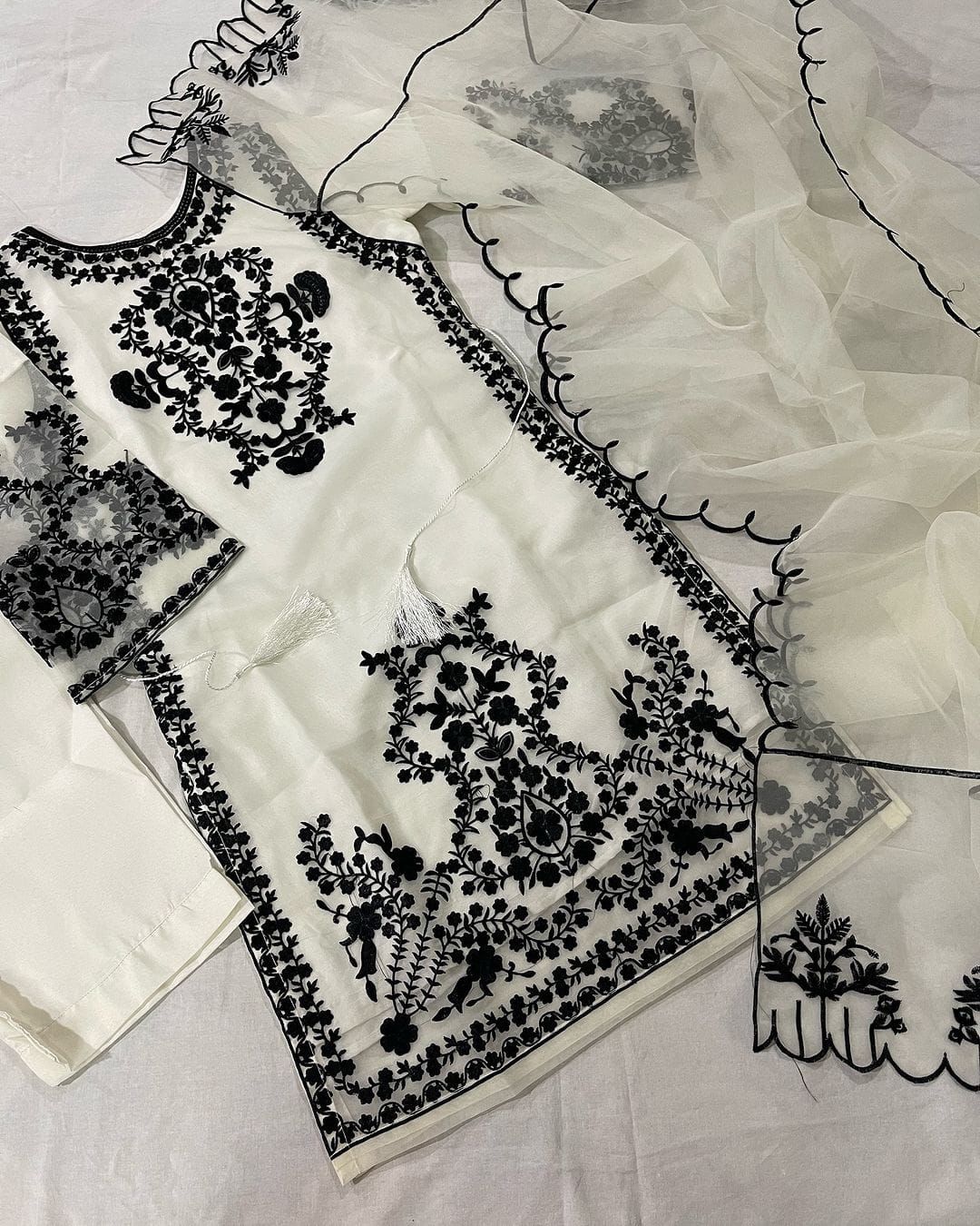 Ready-to-wear stitched organza suit with embroidered trousers and shirt