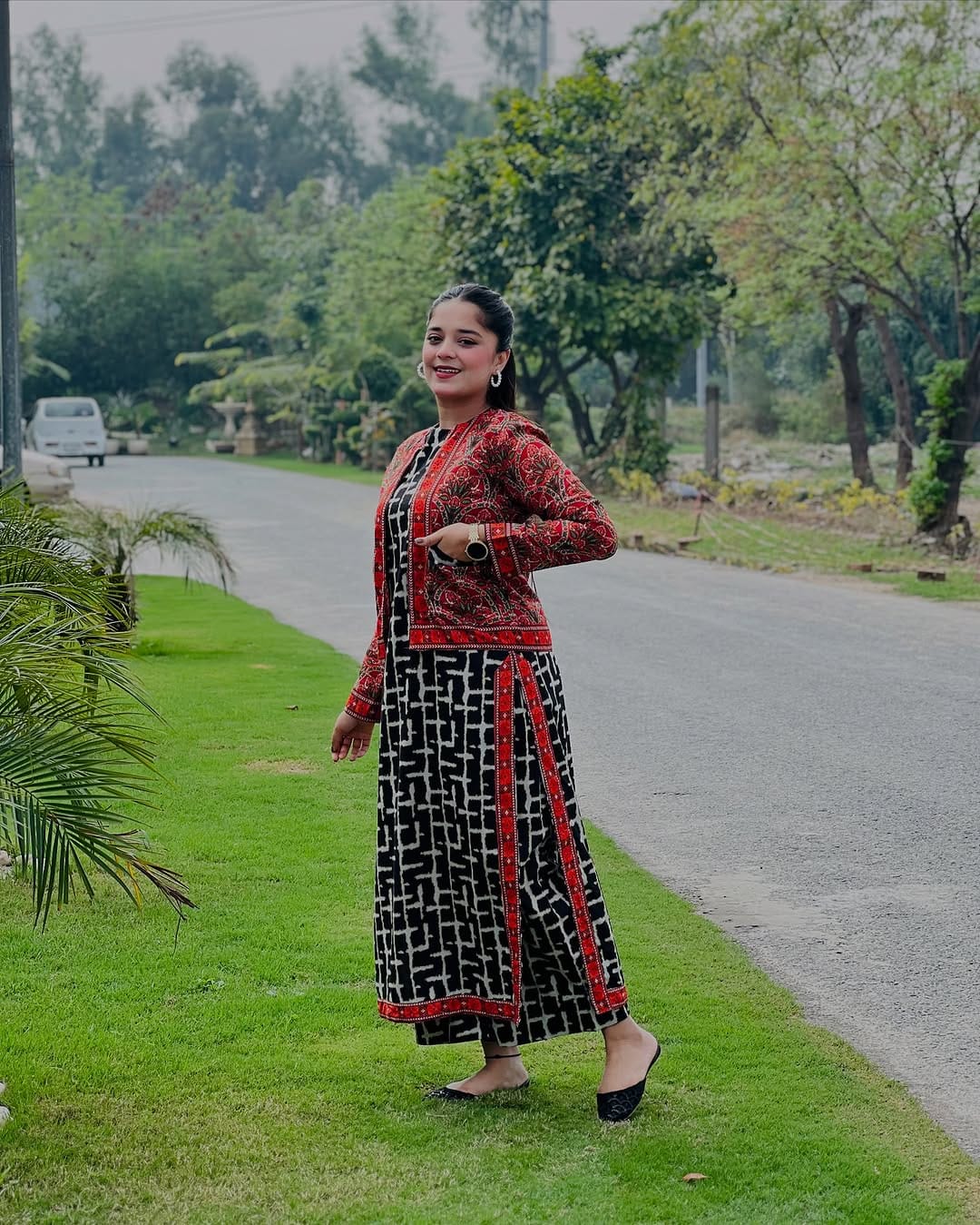 Red ethnic jacket paired with digital black lawn kurta