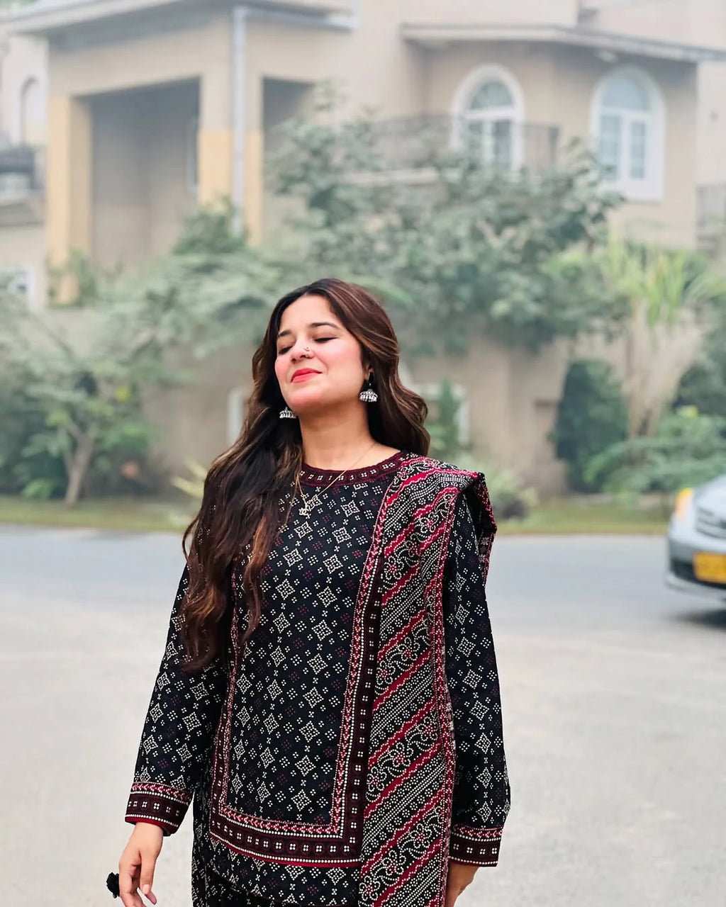 Wide-leg printed trousers in black and white geometric design