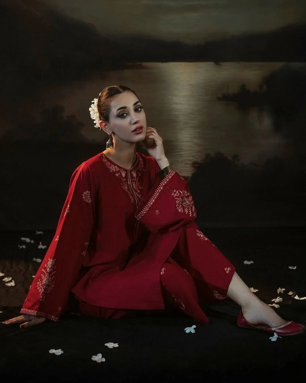 Wide-leg trousers with matching embroidery in crimson shade